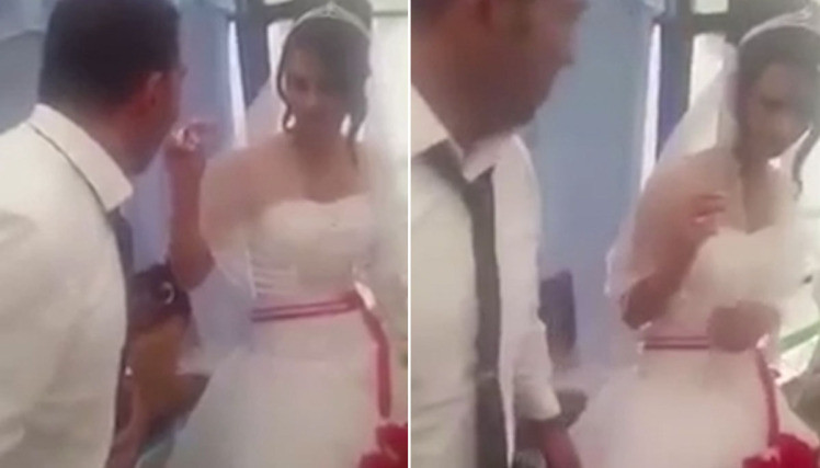 Mireasa a vrut sa glumeasca atunci cand au taiat tortul, dar mirele nu a fost deloc incantat. Gestul facut de barbat. VIDEO