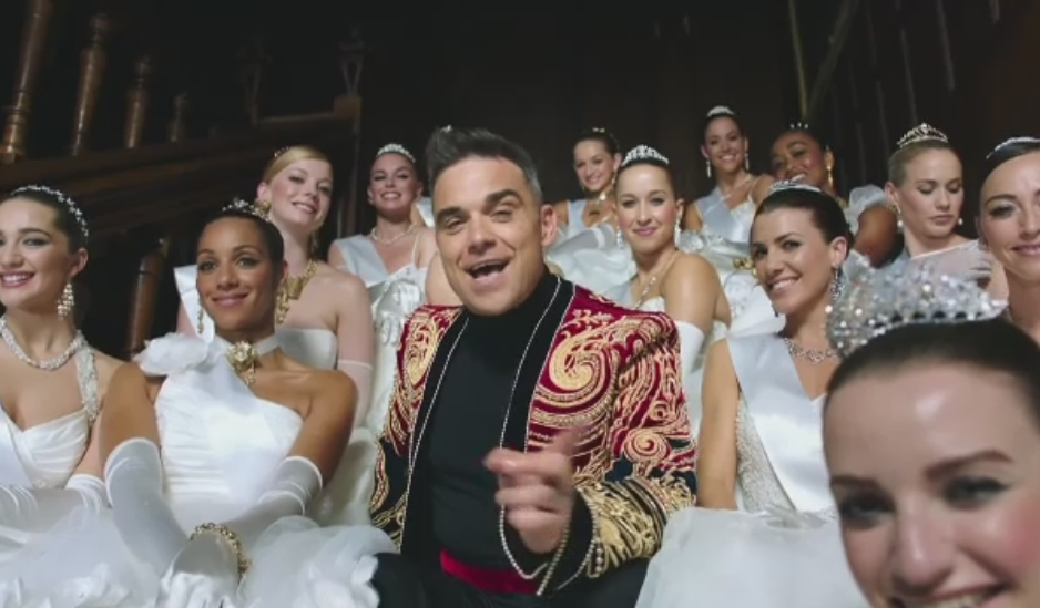 Robbie Williams e acuzat de "rasism" si amenintat ca nu va mai fi primit in Rusia. "Nu cant despre Vladimir Putin"