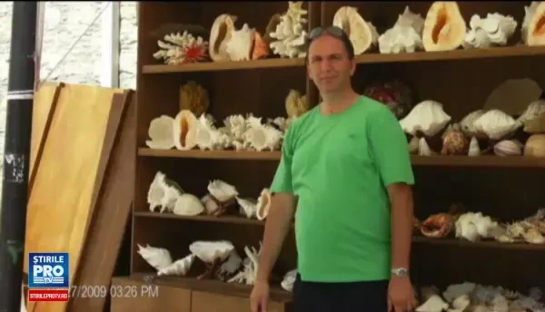 Zece mii de euro spaga pentru un profesor universitar, plus plati in natura. Un student a mers sa ii coseasca iarba