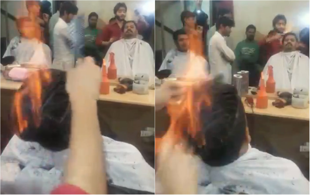 Nu incercati asa ceva acasa! Un frizer din India nu foloseste foarfeca, ci FOCUL