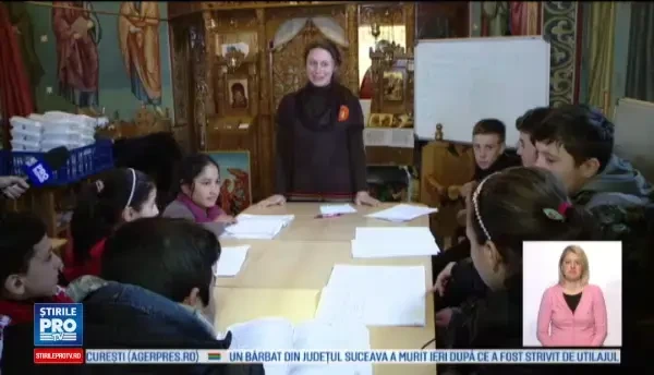 30 de copii defavorizati invata intr-o biserica, in fiecare sambata, engleza sau matematica. Scoala de aici da roade altfel