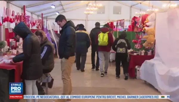 Barbatii au scapat de Valentine's Day si dau de Martisor. Aventura lui Roberto la targ