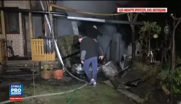 Cabana distrusa de flacari, la Ipotesti, dupa ce o masina din garaj a luat foc. O gravida in 9 luni a facut un atac de panica