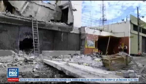 Zeci de barbati au jefuit sediul unei firme de securitate, iar un politist a fost ucis. Suma fabuloasa pe care au furat-o