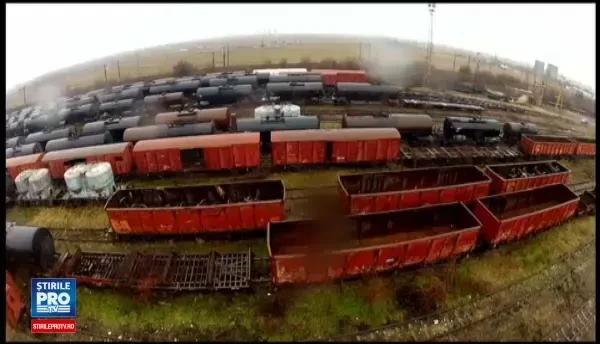 Dosarul CFR Marfa: 21 de persoane retinute, intre care un fost director. 73.900 lei, 15.800 euro si 21.600 dolari, ridicati