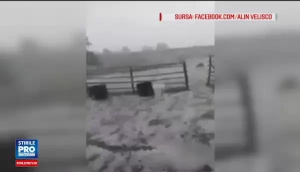 Capitala si patru judete, afectate de ploile torentiale. Orasul in care strazile s-au umplut de apa