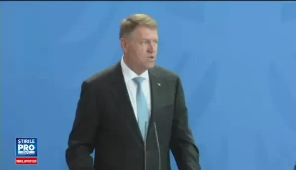 Iohannis, primit la Berlin cu prietenie de Merkel: Angela, iti multumesc! Criza politica de la noi si Brexit, discutate