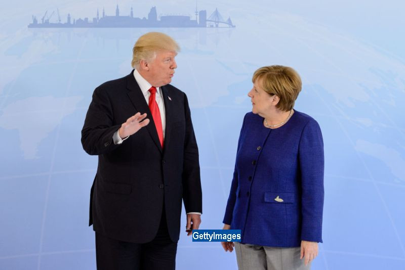 Donald Trump si Angela Merkel, intalnire inainte de Summit-ul G20 de la Hamburg. De ce au ezitat sa dea mana cei doi lideri