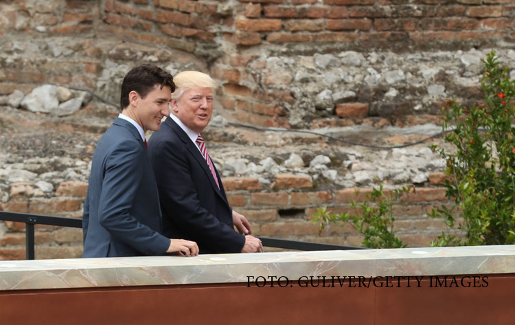 Theresa May si Justin Trudeau incearca sa il convinga pe Trump sa adere din noua la Acordul asupra climei de la Paris