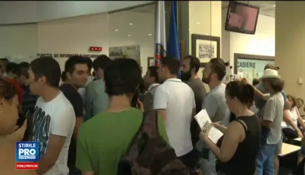 Coada la Primarie pentru cupoanele de biciclete. Asta e pentru fiica mea, asta e pentru sotie, asta e pentru mine