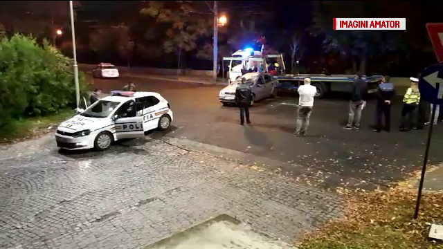 Un şofer s-a răsturnat cu maşina, în Capitală, urmărit de poliţişt. Au tras focuri de armă