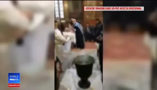 Imagini controversate filmate la un botez: preotul se enervează și bruschează bebelușul
