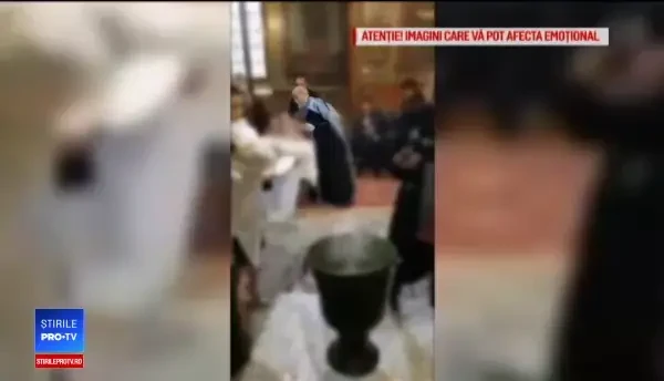 Preotul care a bruscat un bebeluș la un botez nu mai are voie să slujească, timp de 30 de zile