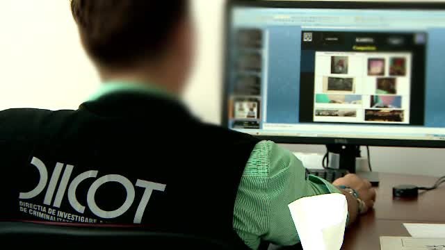 Trei români, reținuți după ce au escrocat persoane din 19 țări. Victimele, păcălite online