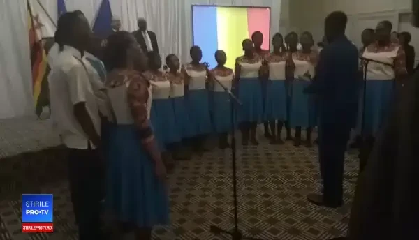 Momentul în care un grup de zimbabwieni cântă Imnul României
