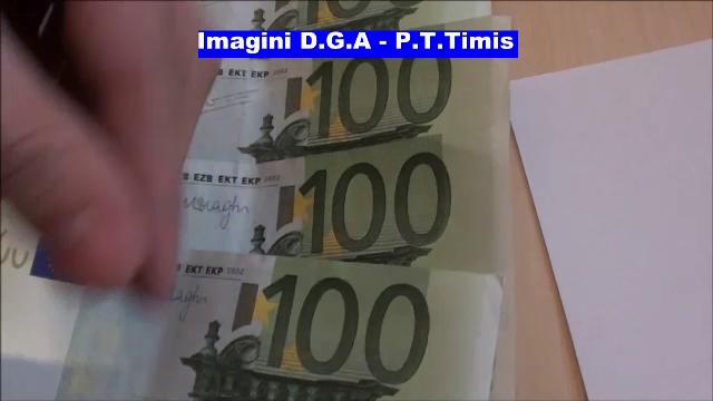 Poliţist din Timiş, prins în flagrant în timp ce lua mită