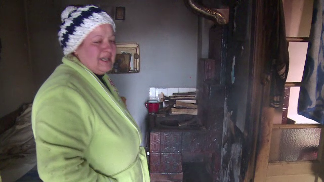 O bătrână a murit, după ce a umplut soba până la refuz cu lemne