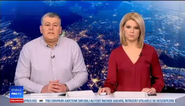 O mamă și cei trei copii, salvați la limită dintr-o clădire în flăcări