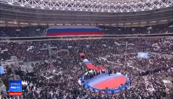 Vladimir Putin acuzat că a obligat ruși să participe la mitingul de pe stadionul Luzhniki