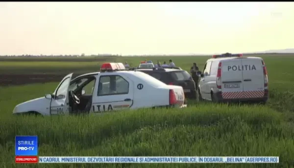 Focuri de armă pe un câmp de lângă Ploieşti. Un bărbat înarmat cu un topor, împușcat de polițiști