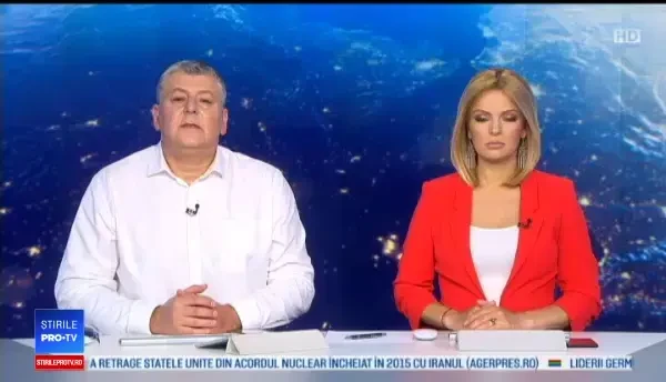 Momentul când o fetiță este salvată, după ce a rămas agățată la etajul cinci