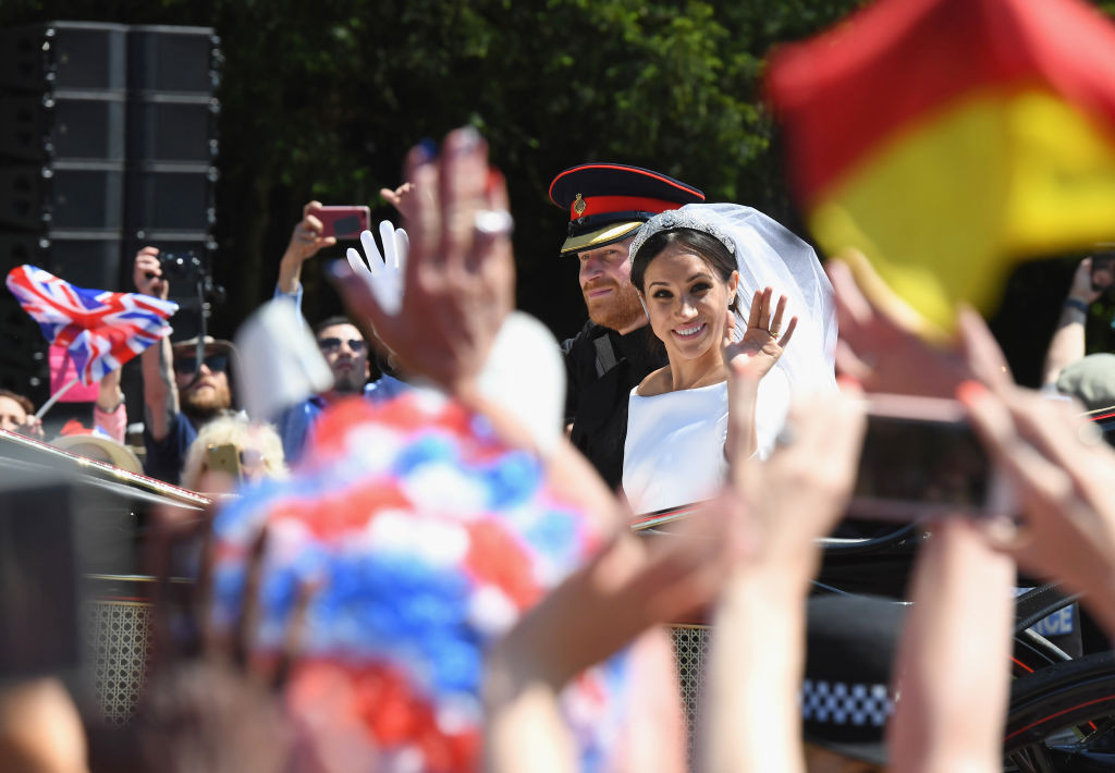 Harry si Meghan in caleasca