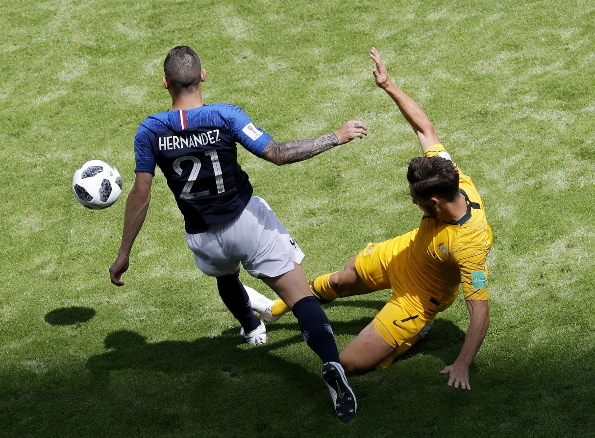 Lucas Hernandez (L) of France and Mathew Leckie of Australia
