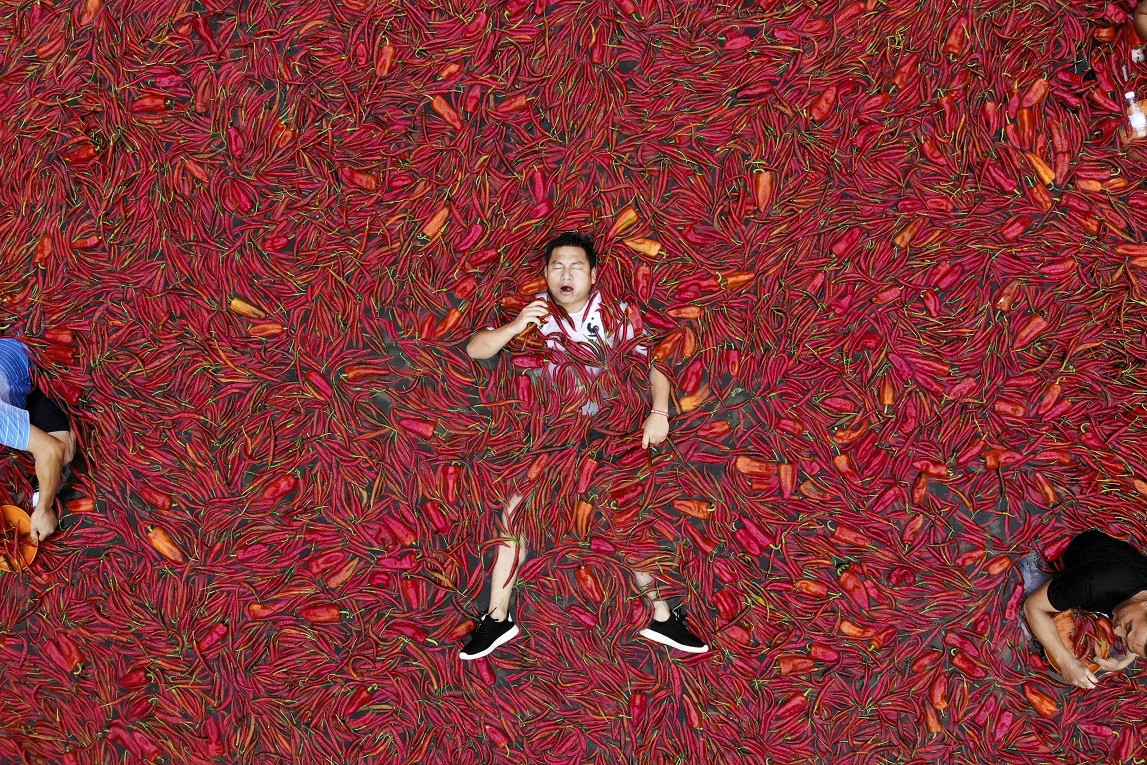 Un chinez a mâncat 50 de ardei iuţi în mai puţin de un minut. Ce a urmat