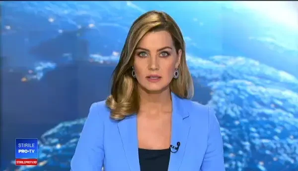 Un client a intrat într-un magazin de haine şi a furat telefonul vânzătoarei. VIDEO