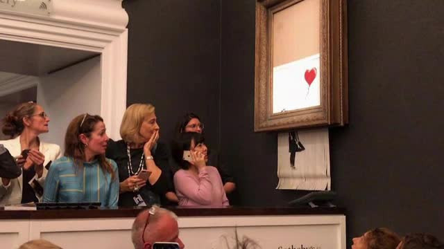 Un tablou Bansky faimos s-a autodistrus imediat după ce a fost cumpărat