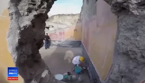 Un mesaj descoperit pe peretele unei case rescrie istoria