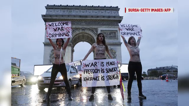 Trei activiste Femen au protestat la Paris față de "criminalii de război"