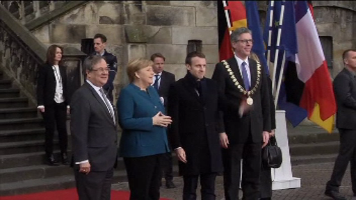 Merkel și Macron, acuzați că vor să creeze "o super-UE", au fost fluierați în Germania