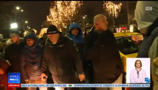 Reacțiile taximetriştilor la protestul față de Uber. Un şofer, prins în aglomerație