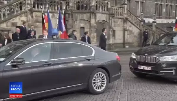 Merkel și Macron, acuzați că vor să creeze "o super-UE", au fost fluierați în Germania