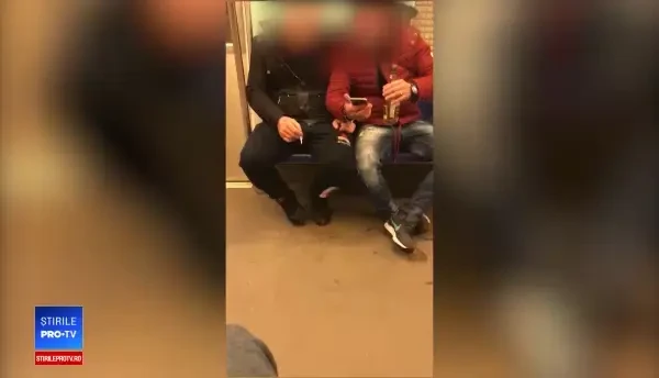 Doi bărbați, filmați fumând și consumând alcool în metrou, în Capitală