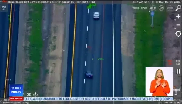 Momentul în care un fugar este încolțit la sol și din aer de polițiști