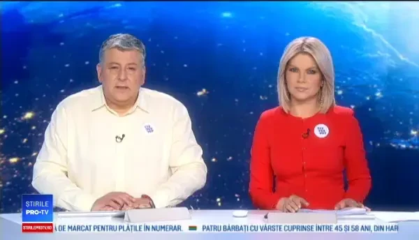 Un tânăr s-a refugiat pe faţada blocului, după ce apartamentul i-a luat foc. VIDEO