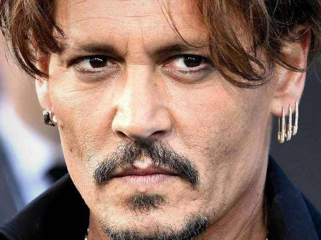 Johnny Depp va da în judecată tabloidul The Sun pentru defăimare. Ce s-a întâmplat