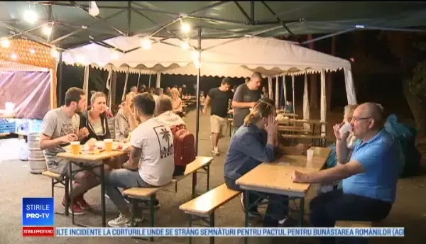 Gogoși americane printre pastramă de berbecuț și must, la un festival culinar din București