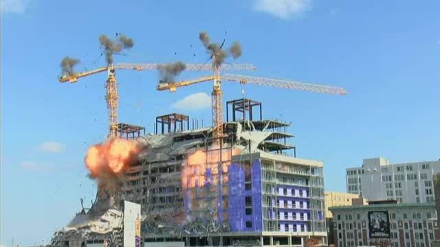 Două macarale gigantice, demolate prin implozie pentru a căuta trupul unui bărbat dispărut