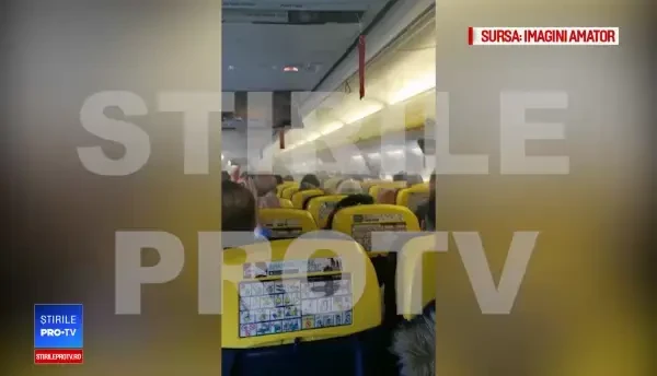 Imagini din avionul Ryanair care a aterizat de urgență pe Otopeni. Pasagerii urlă de GROAZĂ