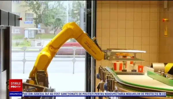Primul fast-food în care servirea se face cu ajutorul roboților. Clienții nu mai intră în contact cu nimeni