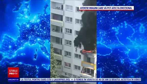 Scene dramatice în timpul unui incendiu. Doi copii, salvați dintr-un bloc cuprins de flăcări, după ce s-au aruncat în gol