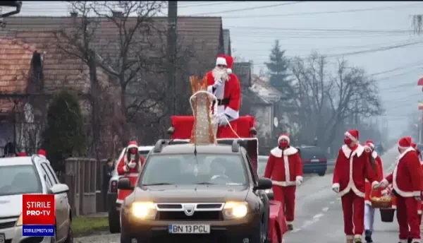 Peste 5.000 de daruri dulci, împărțite de Moș Crăciun tuturor localnicilor din comuna Livezile