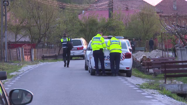 Focuri de armă într-o comună din Ilfov. O femeie a fost amenințată pe stradă
