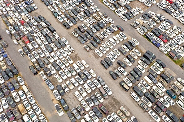 Un imens cimitir cu peste 200.000 de maşini a apărut în China, după inundaţiille devastatoare. GALERIE FOTO