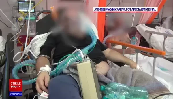 Imagini dramatice. Cu lacrimi în ochi, un pacient își salută soția, internată și ea cu Covid, la alt spital. VIDEO