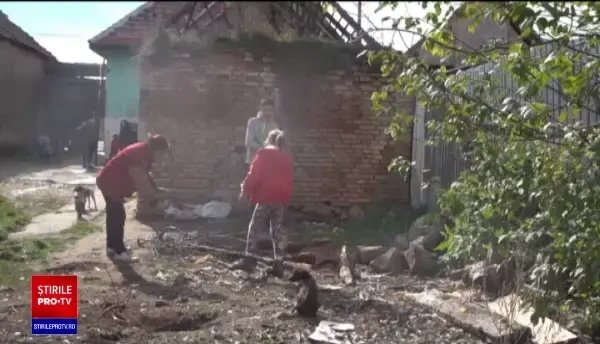 În prag de iarnă, o familie cu șapte copii riscă să rămână fără acoperiș deasupra capului. Cu toții trăiesc într-un beci