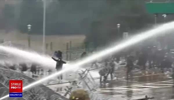 Unii migranți sunt dispuși să se întoarcă în țările lor, după ce polonezii au pus tunurile cu apă pe ei